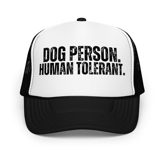 A black and white trucker hat with the text 'DOG PERSON. HUMAN TOLERANT.' – Boozie Adams