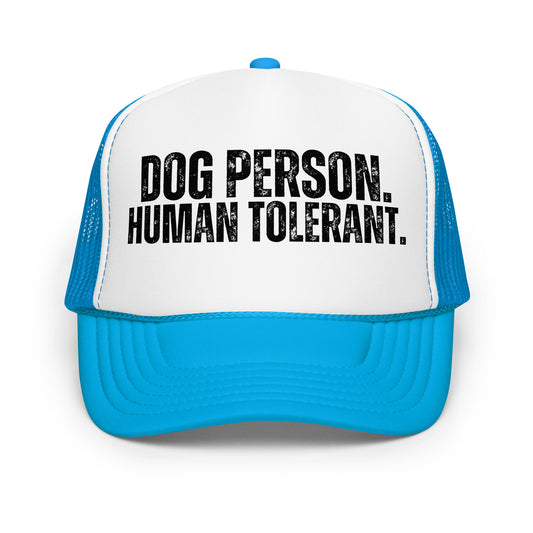 A blue and white trucker hat with the text 'DOG PERSON. HUMAN TOLERANT.' – Boozie Adams