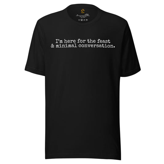 Black unisex t-shirt with white text 'I'm here for the feast & minimal converstion' – Boozie Adams