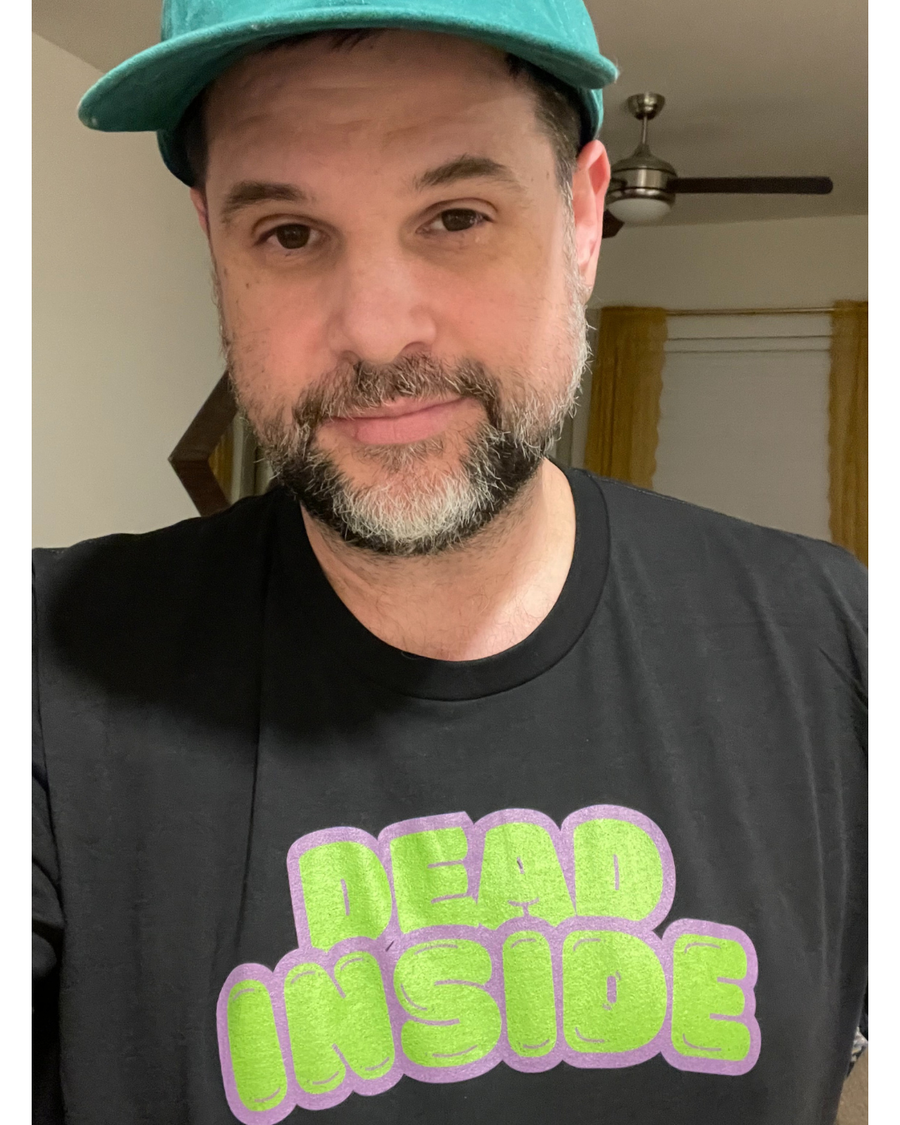 Customer photo wearing Boozie Adams Tee