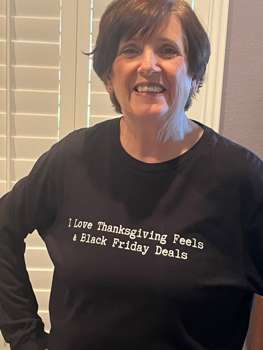 Customer wearing Boozie Adams I Love Thanksgiving Feels & Black Friday Deals Tee