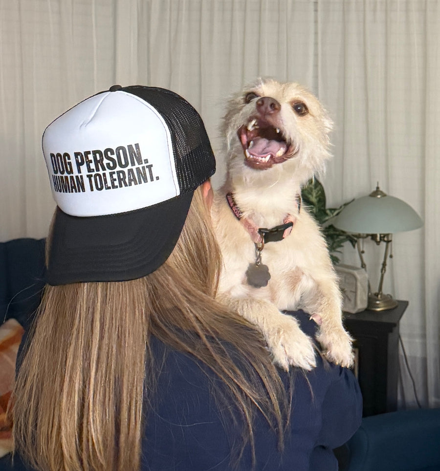Boozie in the Wild customer wearing Dog Person. Human Tolerant. trucker hat.