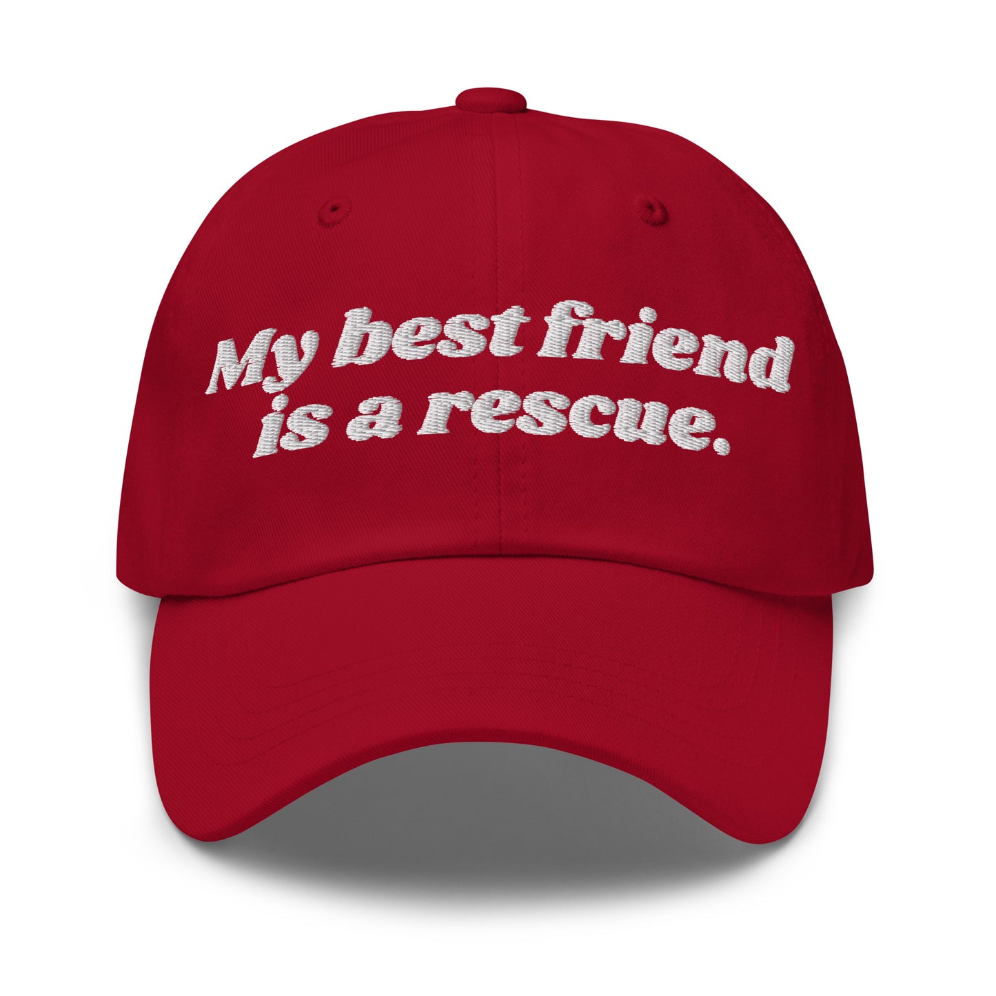 A red unisex dad hat with embroidered text 'My best friend is a rescue.' – Boozie Adams