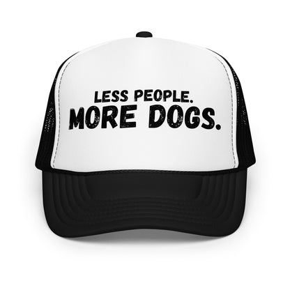 A black and white unisex trucker hat with the text 'LESS PEOPLE. MORE DOGS.' – Boozie Adams