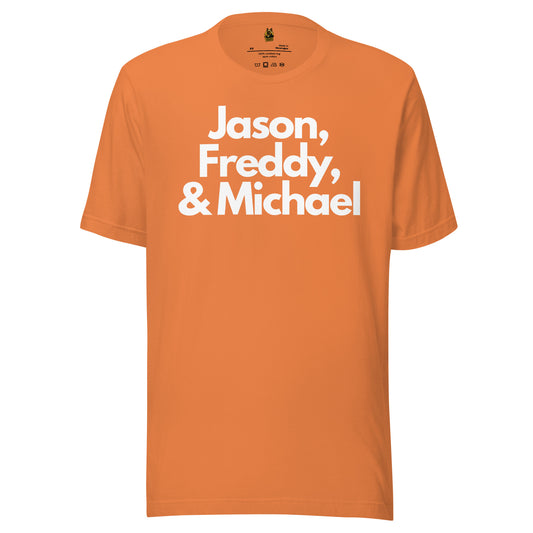 Orange unisex t-shirt with white text 'Jason, Freddy, & Michael'  – Boozie Adams