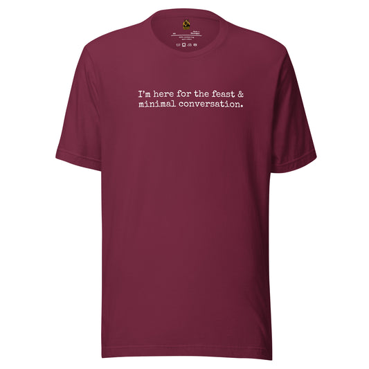 Maroon t-shirt with white text 'I'm here for the feast & minimal converstion' – Boozie Adams